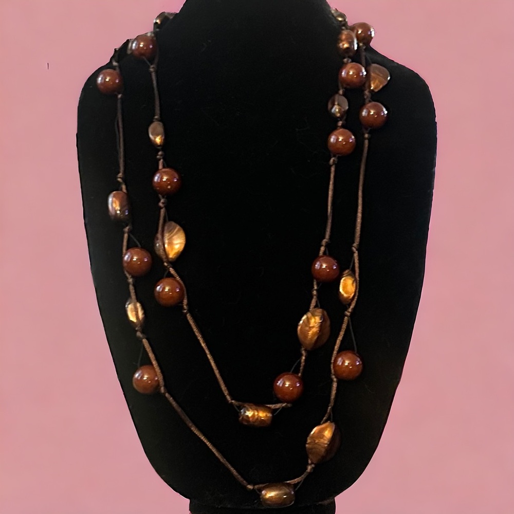 Isis long polished bead station cord necklace